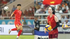 Quang Kiệt và Thanh Thúy cầm cờ Việt Nam tại lễ khai mạc ASIAD 2026